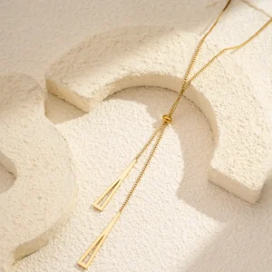 Collier Nœud en Acier Doré